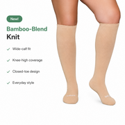 Beige knee-high bamboo-blend compression socks with wide-calf fit and closed-toe details.