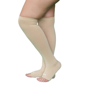 Beige knee-high open-toe compression stockings shown on the legs from the side.