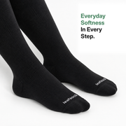 Close-up of black bamboo compression socks showing the foot and ankle.